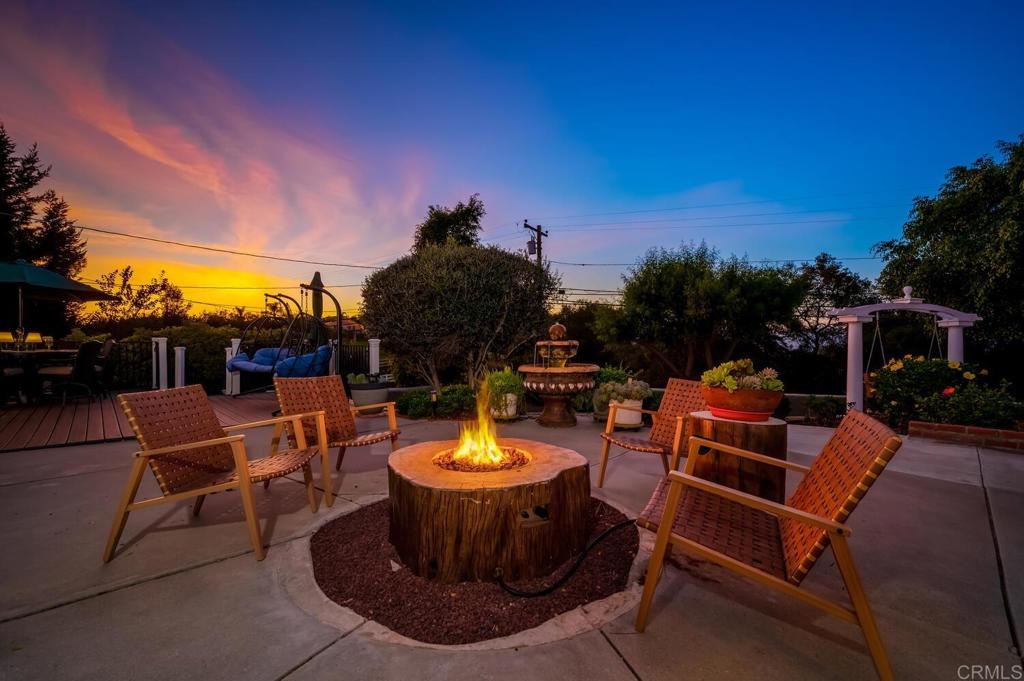 2469 East Mission Road Fallbrook, CA 92028 - Photo 7 of 32 a view of a chairs and table in the terrace