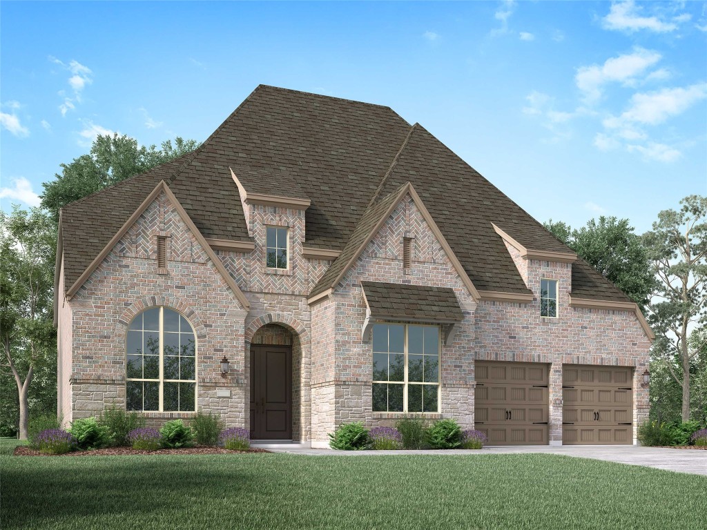 150 Leaning Rock Ridge Austin, TX 78737 - Photo 1 of 1 French country inspired facade featuring brick siding, a front yard, a shingled roof, driveway, and stone siding
