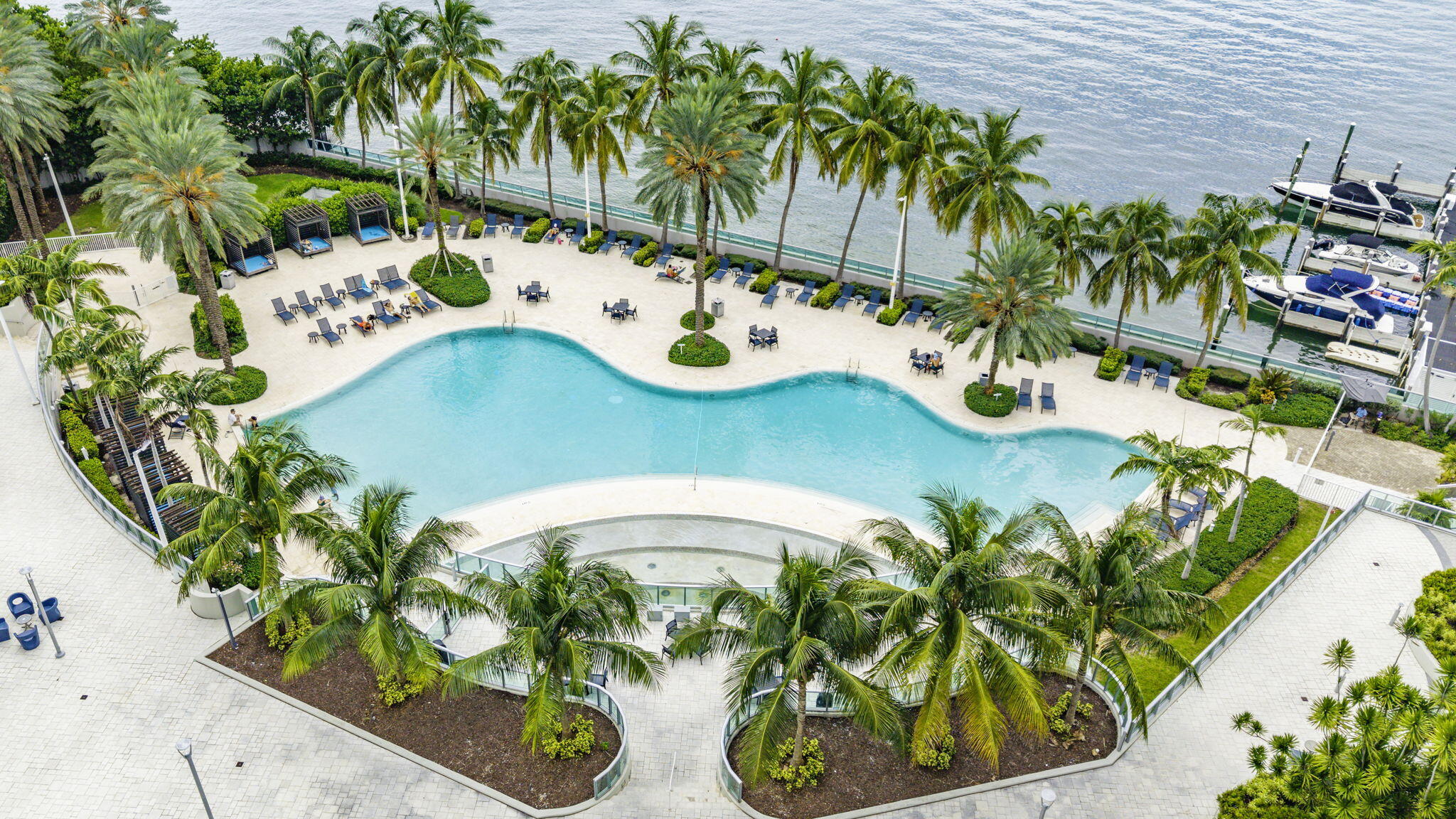 1500 Bay Road, Unit 1122S Miami Beach, FL 33139 - Photo 1 of 24 a picture of a table with chairs