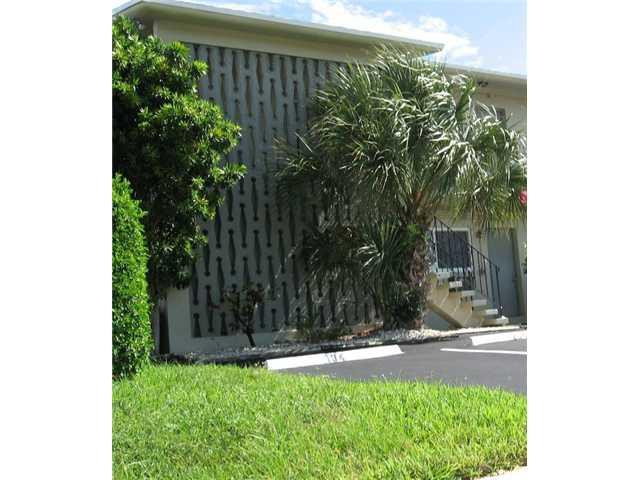 301 East McNab Road, Unit 102 Pompano Beach, FL 33060 - Photo 7 of 9 Exterior Front