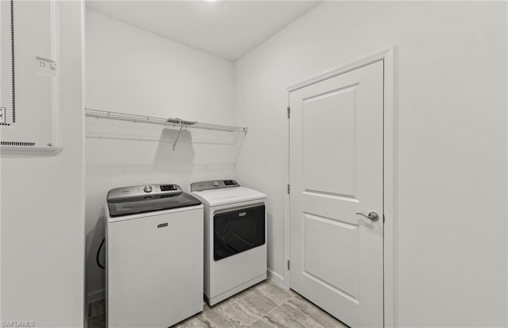 3922 East Hampton Circle Fort Myers, FL 33905 - Photo 21 of 24 a utility room with washer and dryer