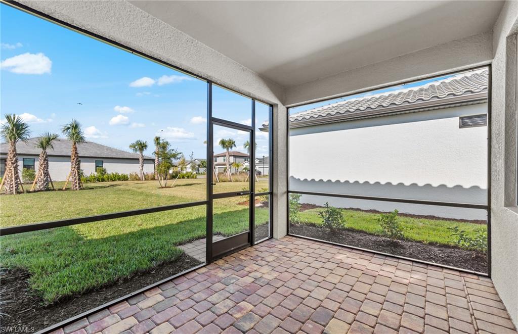 3922 East Hampton Circle Fort Myers, FL 33905 - Photo 23 of 24 a view of a porch with a yard