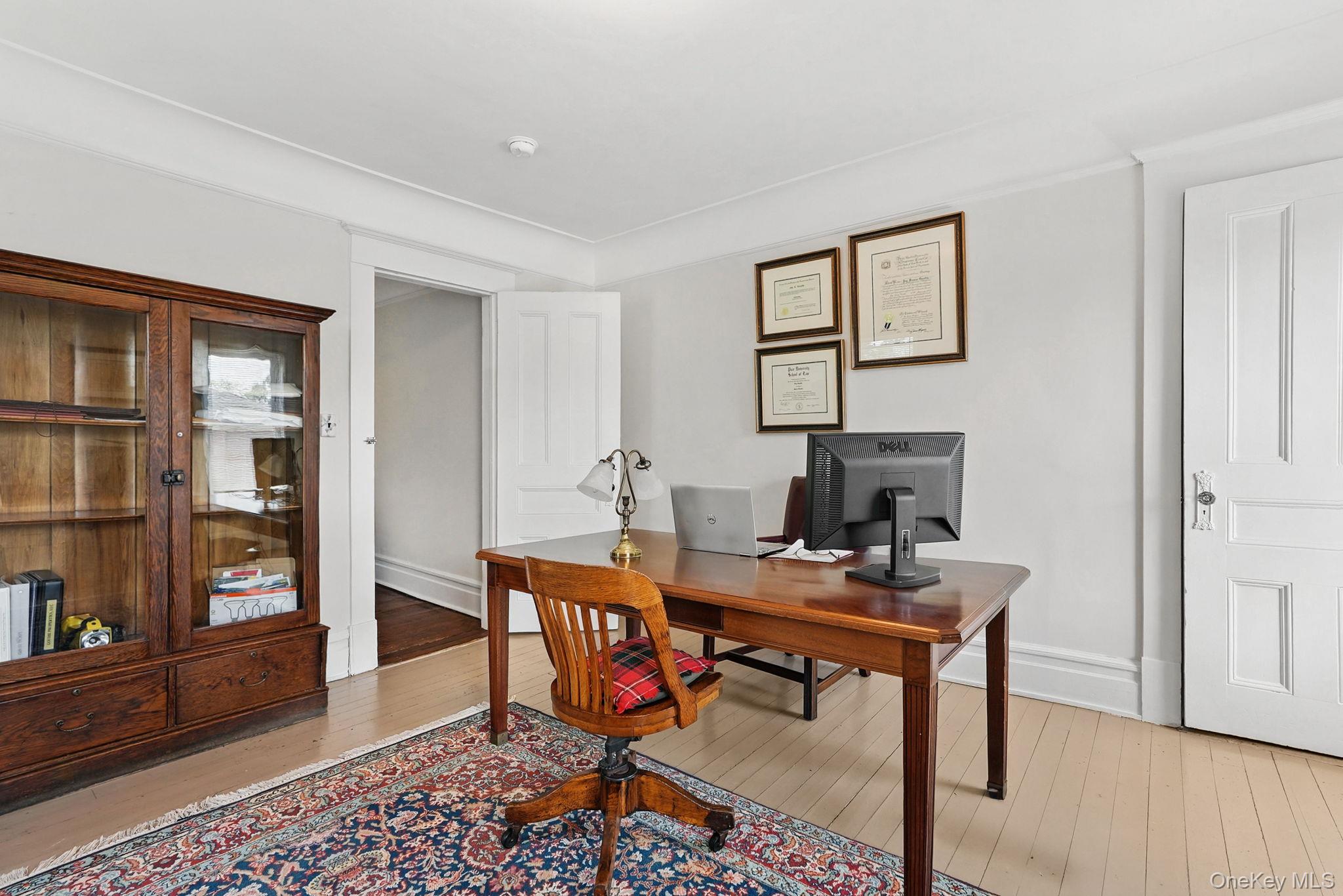 134 Old Mamaroneck Road White Plains, NY 10605 - Photo 15 of 23 a workspace with furniture and wooden floor