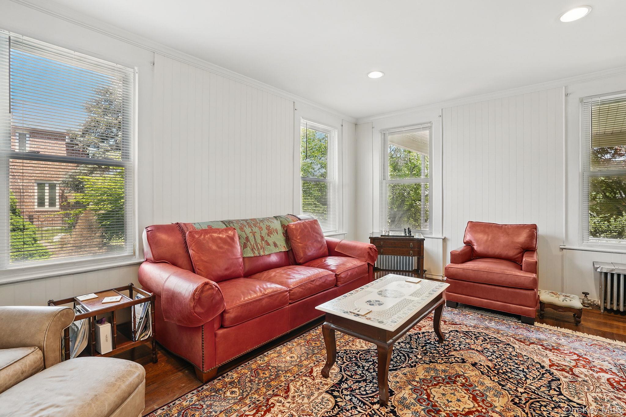 134 Old Mamaroneck Road White Plains, NY 10605 - Photo 9 of 23 a living room with furniture a rug and a window