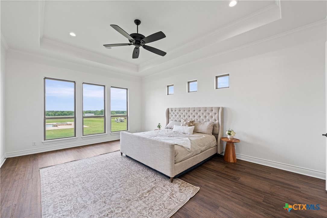 11023 Bigham Road Troy, TX 76579 - Photo 20 of 42 a bedroom with a large bed and a window