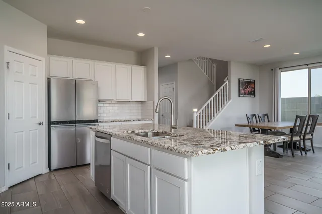 a room with a window and a flat screen tv