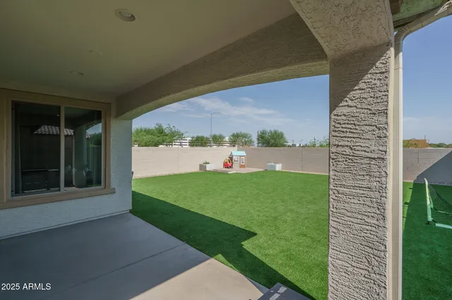 a bathroom with a double vanity sink toilet and shower