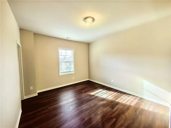 a bathroom with a sink vanity and a mirror