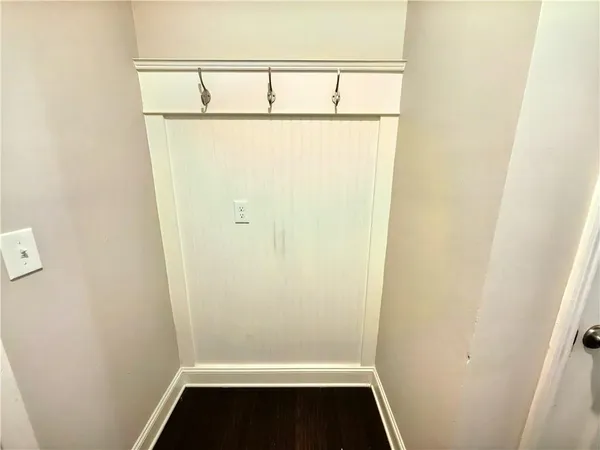 a view of a room with racks on the wall