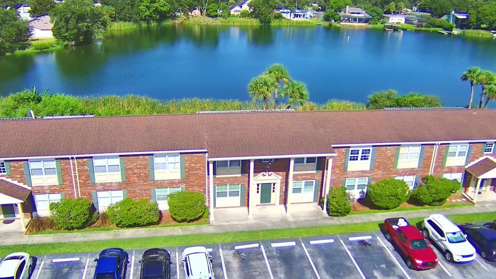 1920 East Edgewood Drive, Unit R8 Lakeland, FL 33803 - Photo 23 of 30 an aerial view of a house with swimming pool and outdoor space