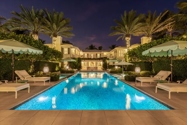a view of a swimming pool with a patio