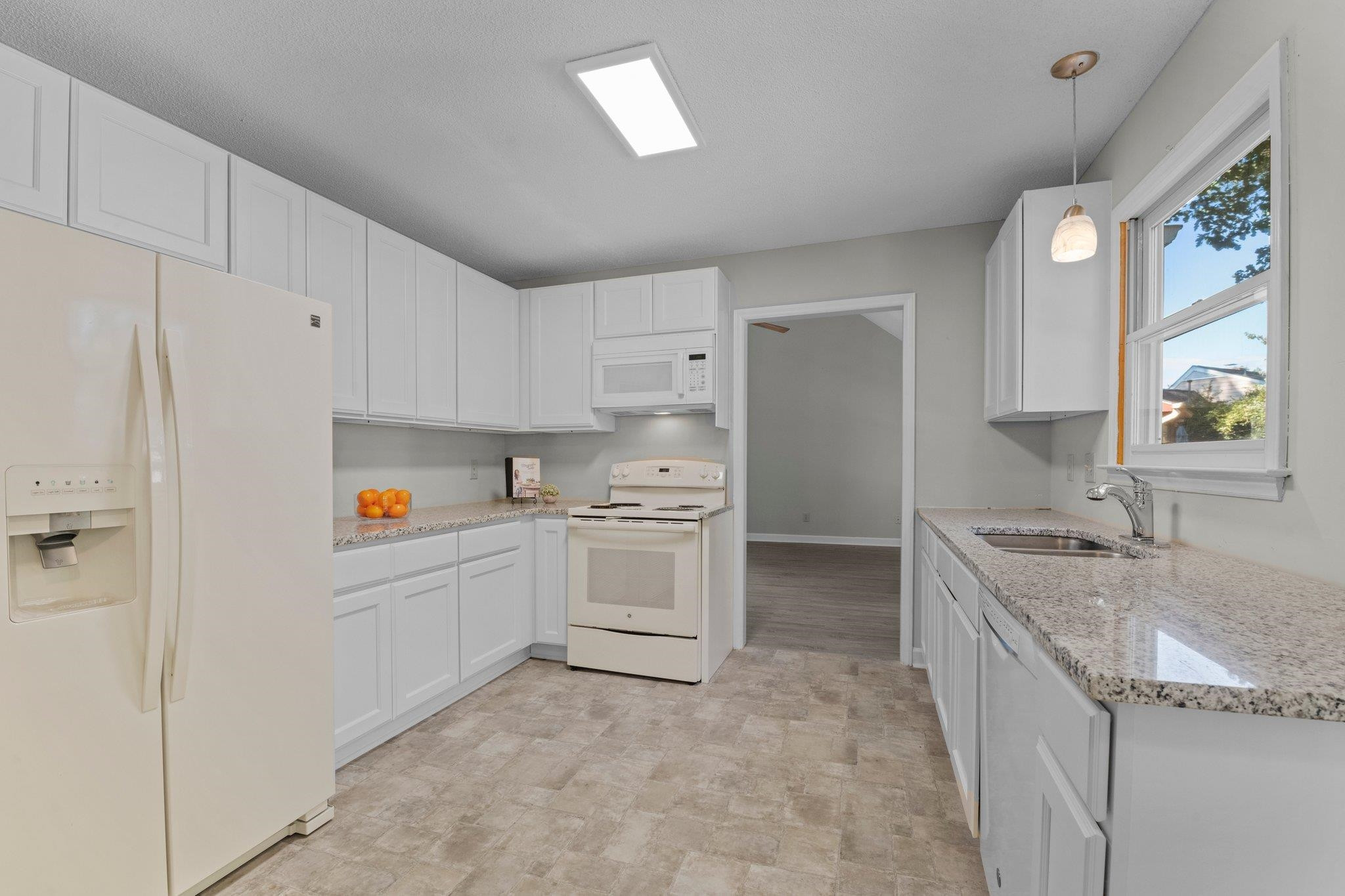 4405 Birmingham Way Raleigh, NC 27604 - Photo 3 of 24 Kitchen upgrades include new cabinets and granite countertops kitchen
