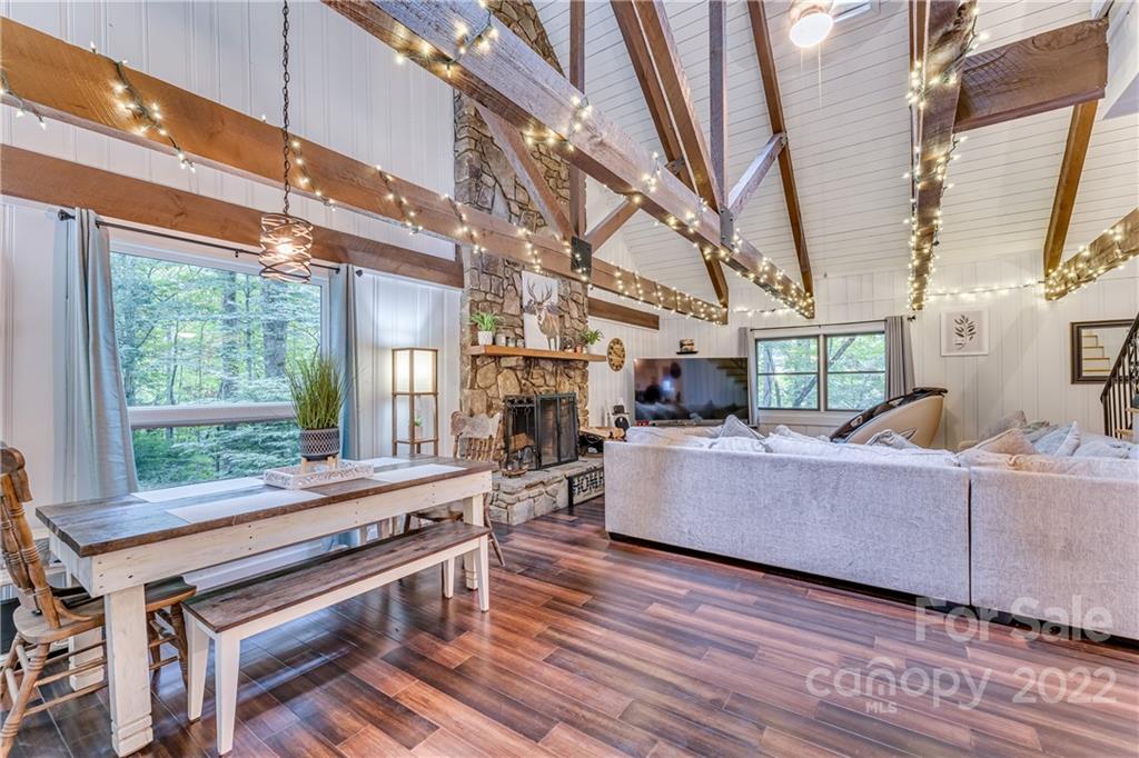 1305 Old Balsam Road Waynesville, NC 28786 - Photo 14 of 42 a living room with furniture and a window