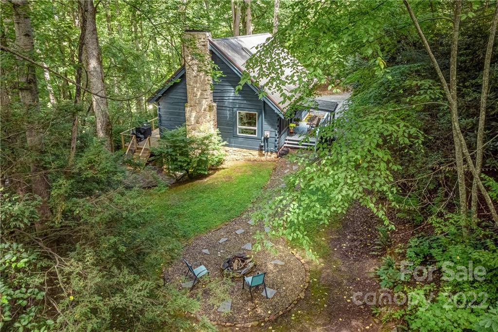 1305 Old Balsam Road Waynesville, NC 28786 - Photo 3 of 42 a view of a yard in front of house