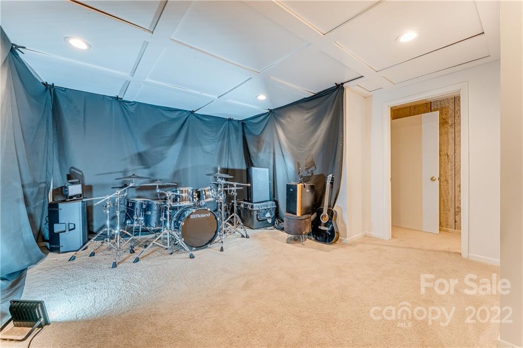 1305 Old Balsam Road Waynesville, NC 28786 - Photo 35 of 42 a room with gym equipment and white walls