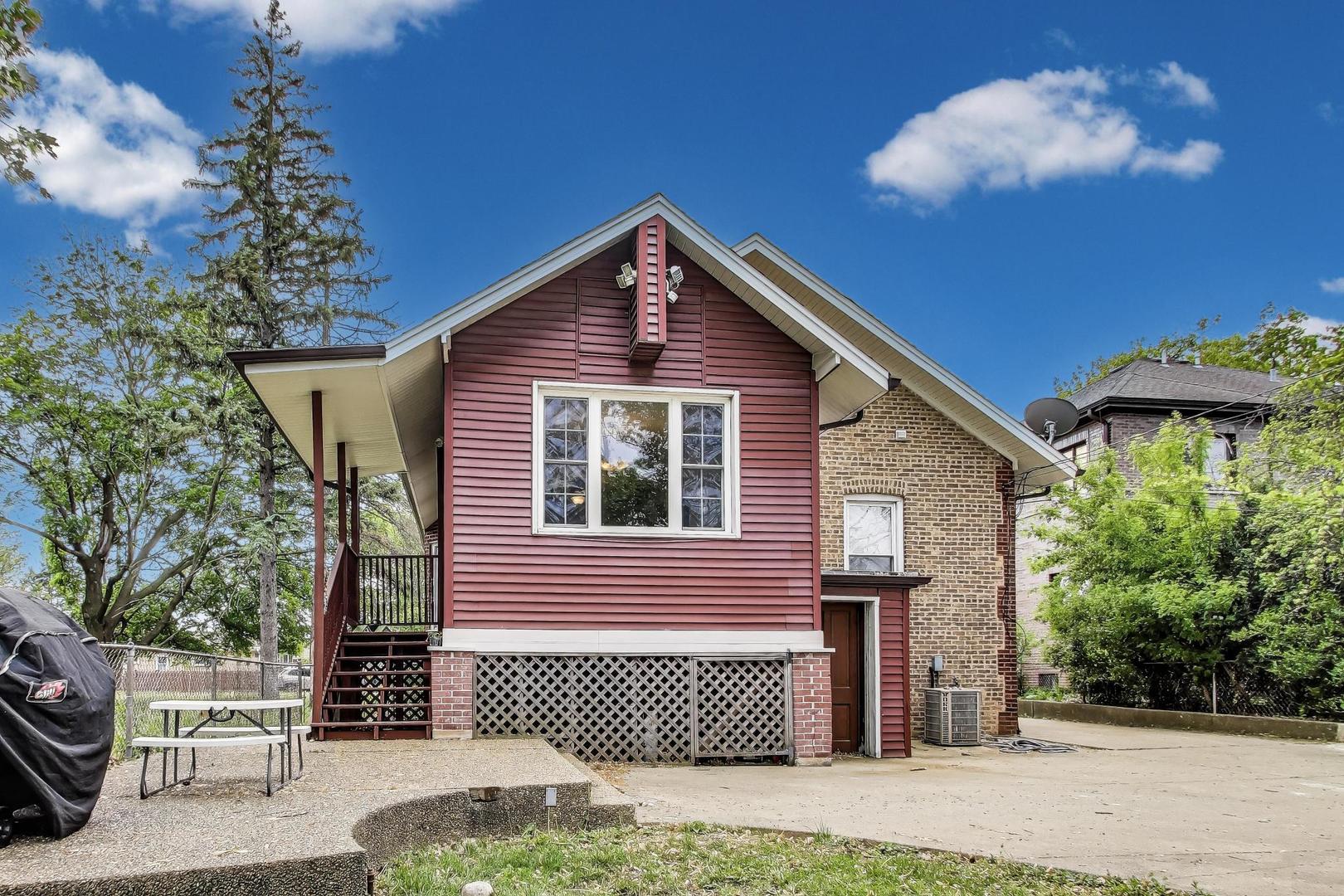 36 Touhy Avenue Park Ridge, IL 60068 - Photo 19 of 28 a front view of a house with a yard