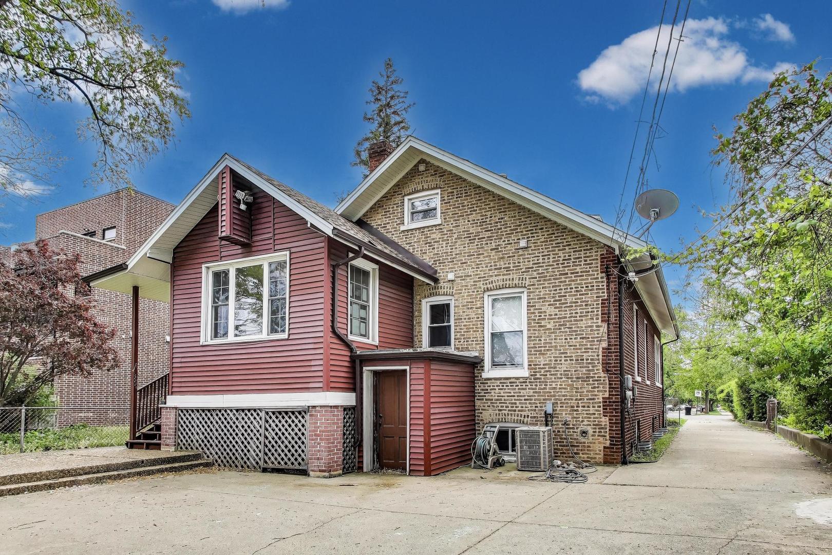 36 Touhy Avenue Park Ridge, IL 60068 - Photo 20 of 28 a front view of a house with a yard