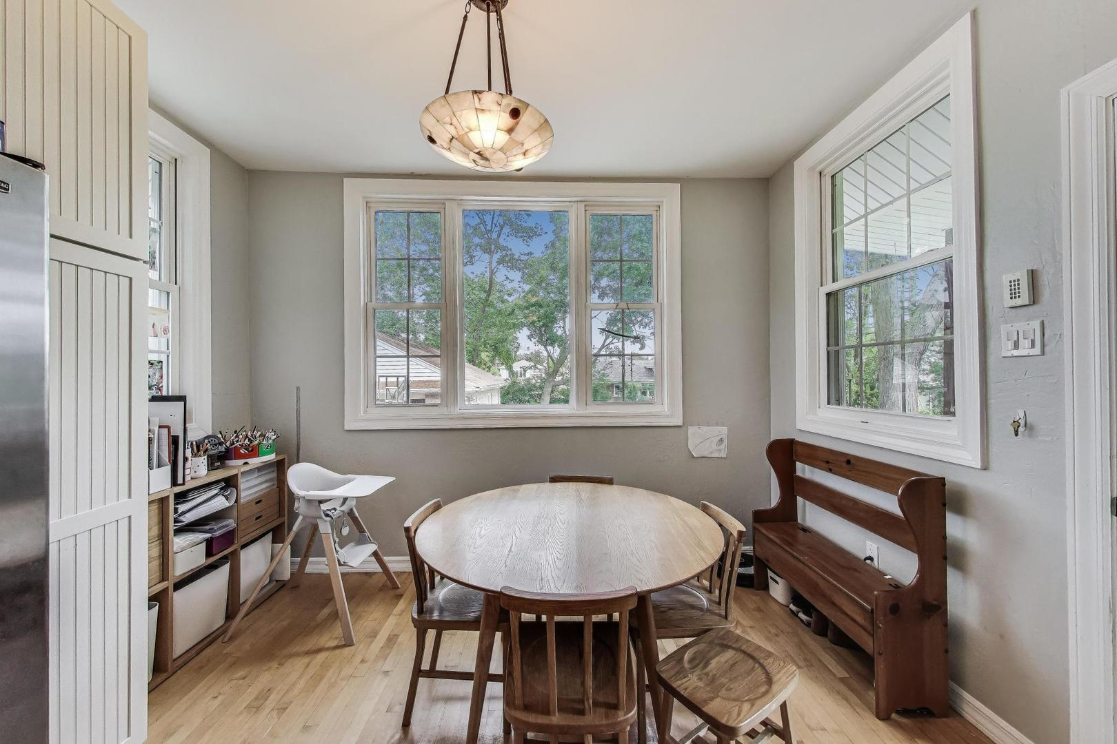 36 Touhy Avenue Park Ridge, IL 60068 - Photo 10 of 28 a view of a livingroom with furniture and window