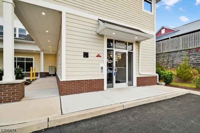 a front view of a house with a garage