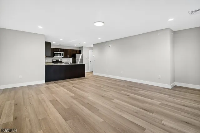 a view of kitchen and microwave