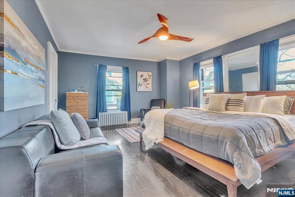 12 Harrison Avenue Montclair, NJ 07042 - Photo 11 of 34 a spacious bedroom with a bed and window