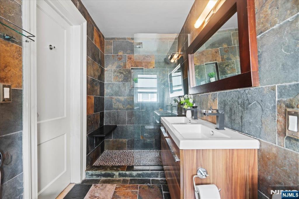 12 Harrison Avenue Montclair, NJ 07042 - Photo 13 of 34 a dining room with table and chairs