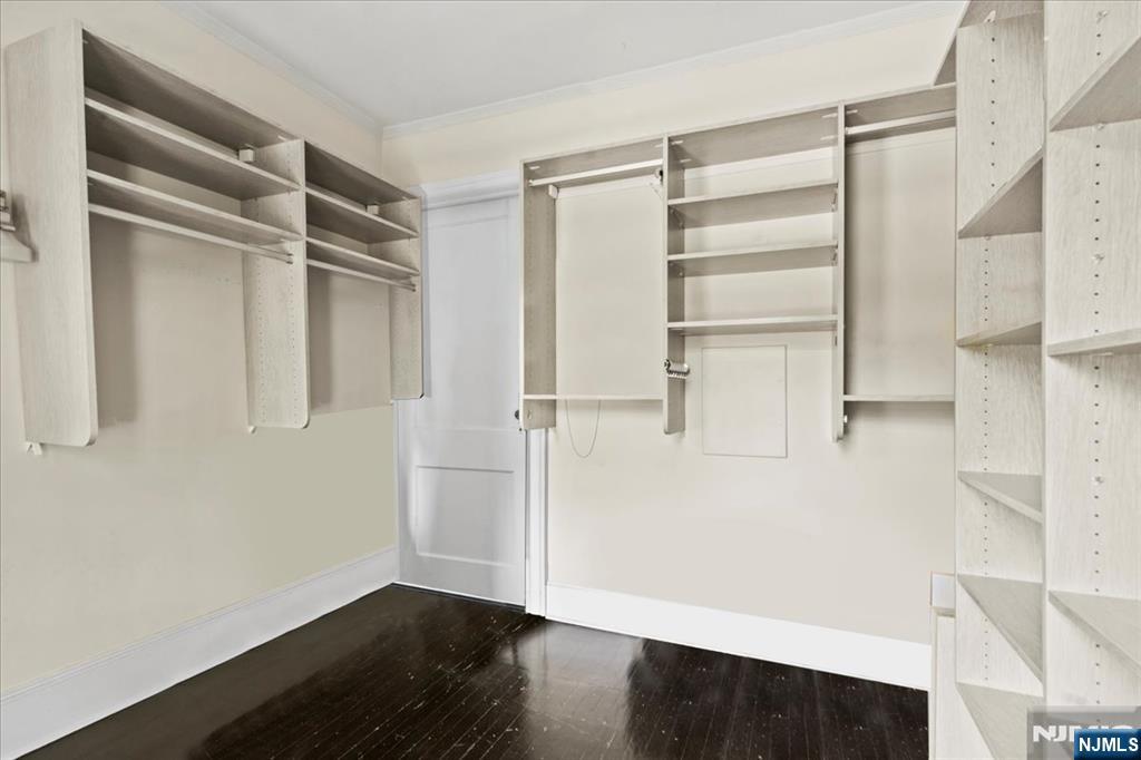 12 Harrison Avenue Montclair, NJ 07042 - Photo 14 of 34 a view of walk in closet with empty racks