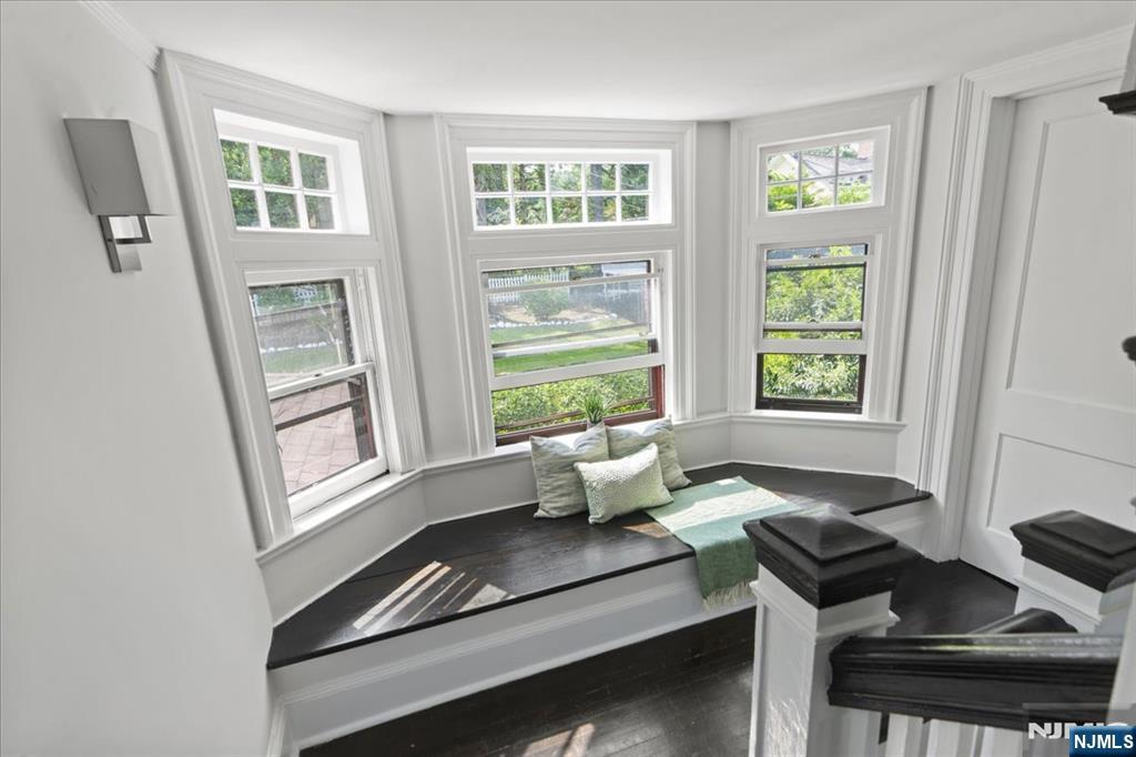 12 Harrison Avenue Montclair, NJ 07042 - Photo 18 of 34 a living room with furniture and a window