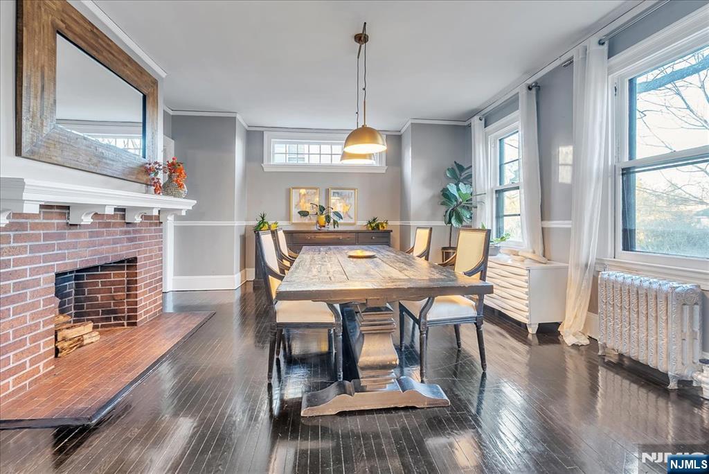 12 Harrison Avenue Montclair, NJ 07042 - Photo 4 of 34 a view of a dining room with furniture window and wooden floor