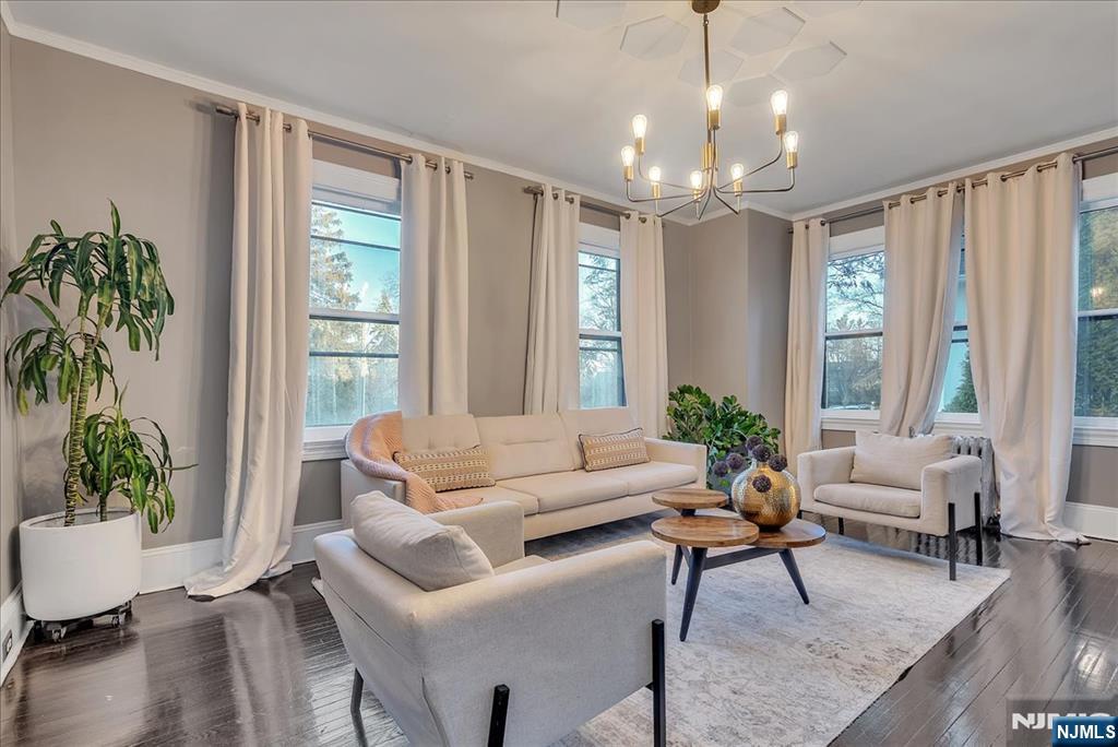 12 Harrison Avenue Montclair, NJ 07042 - Photo 5 of 34 a living room with furniture and a large window