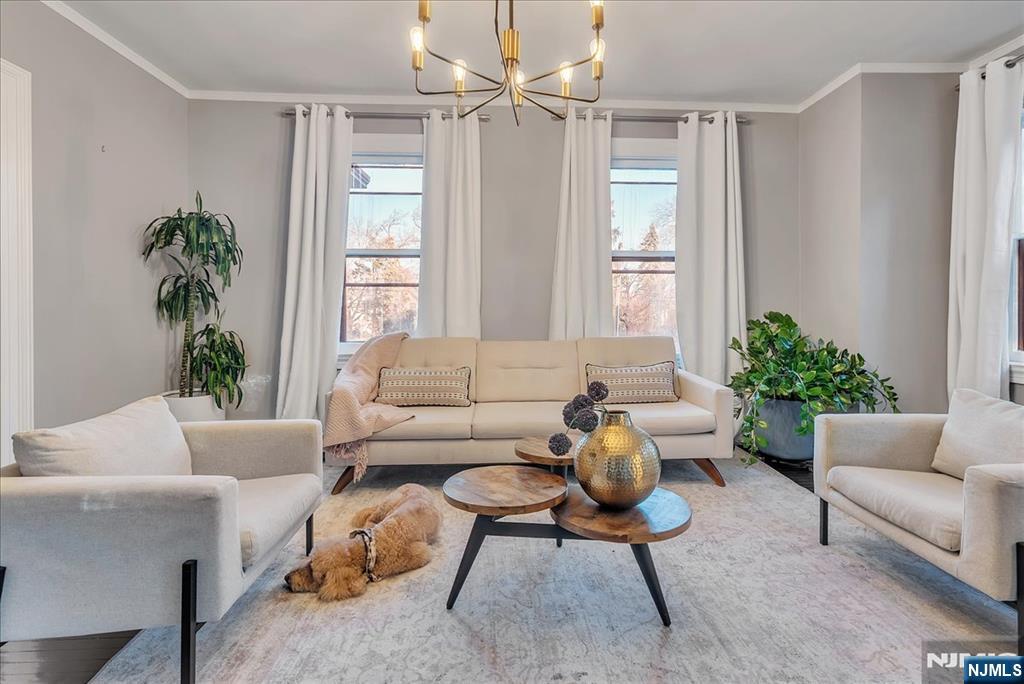 12 Harrison Avenue Montclair, NJ 07042 - Photo 6 of 34 a living room with furniture and a large window