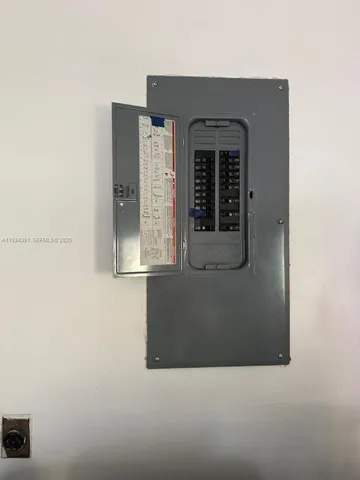 a front view of a house with grey walls