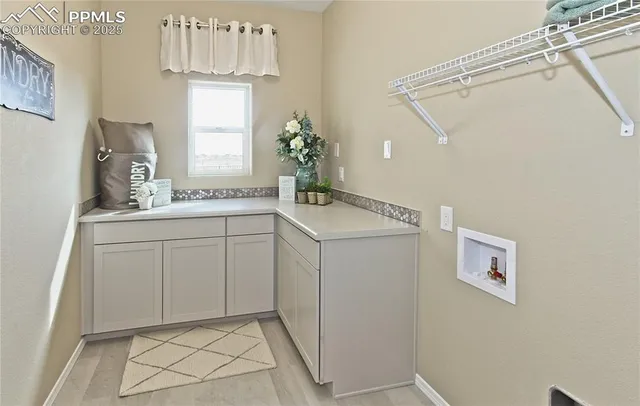 a bathroom with a sink a vanity and a mirror