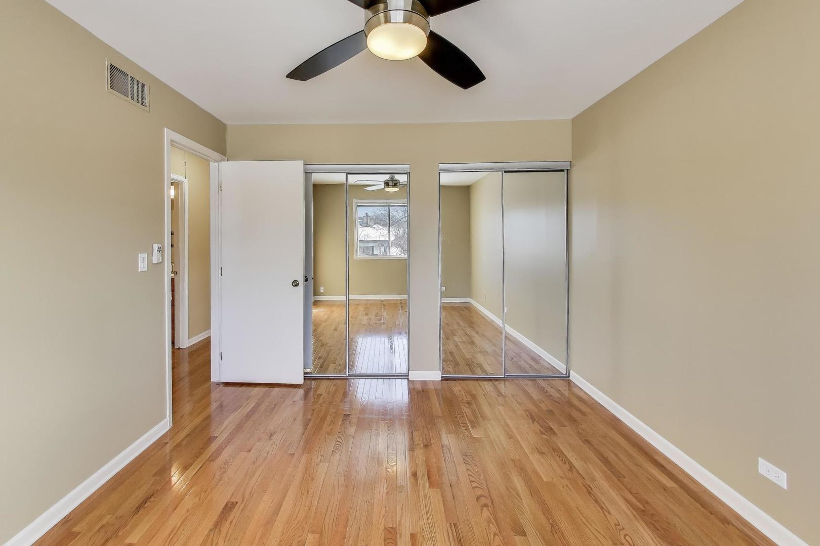 N700 Concord Lane Winfield, IL 60190 - Photo 13 of 31 a view of empty room with wooden floor