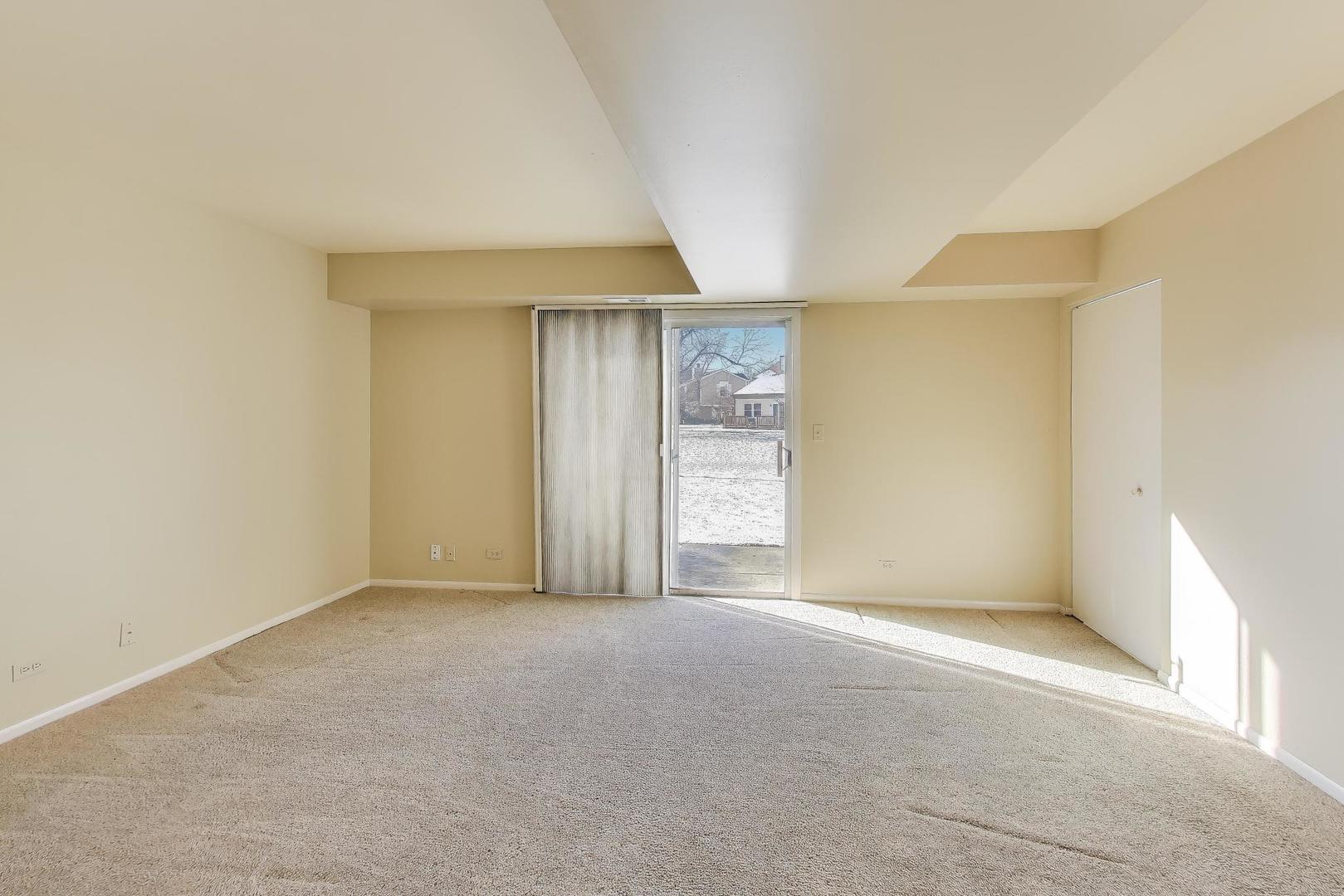 N700 Concord Lane Winfield, IL 60190 - Photo 17 of 31 a view of an empty room with a window
