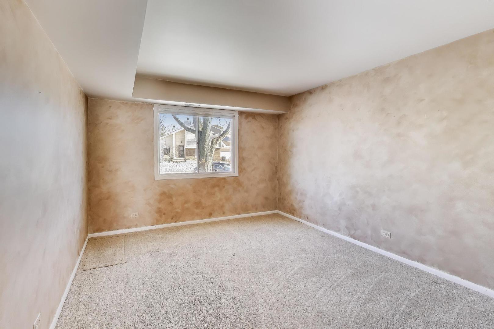 N700 Concord Lane Winfield, IL 60190 - Photo 19 of 31 an empty room with windows and closet