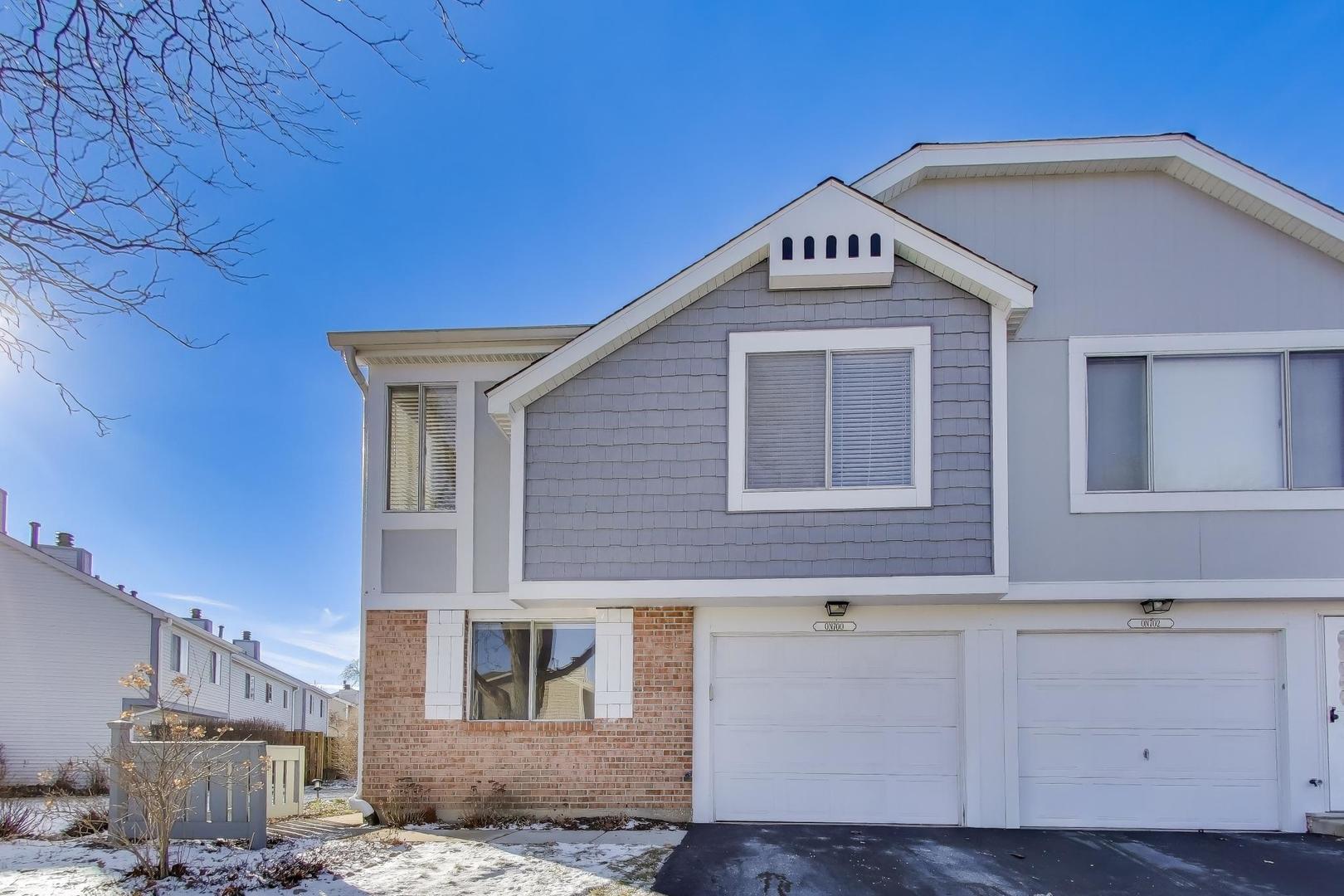 N700 Concord Lane Winfield, IL 60190 - Photo 2 of 31 a front view of a house with a yard