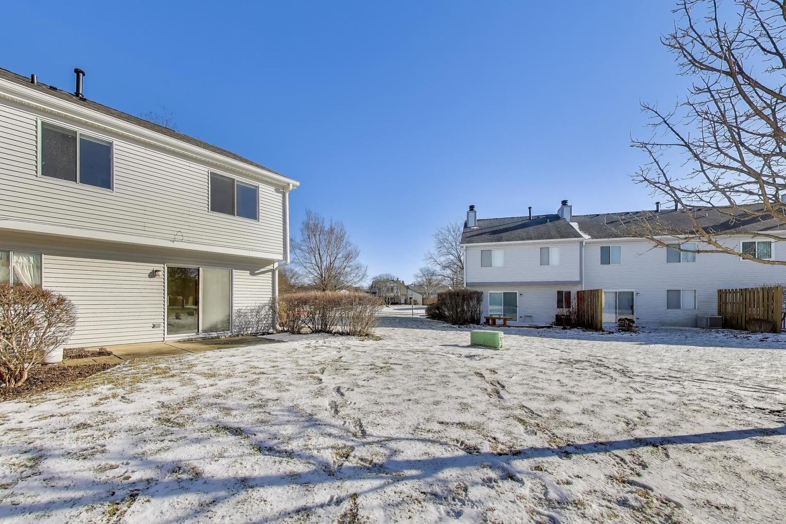 N700 Concord Lane Winfield, IL 60190 - Photo 28 of 31 a view of a house with a patio