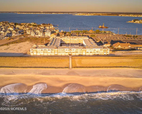 a view of a house with large windows