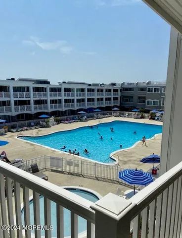 a view of a balcony with ocean view