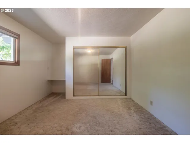 an empty room with a window