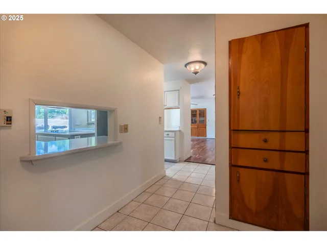 a view of empty room with windows