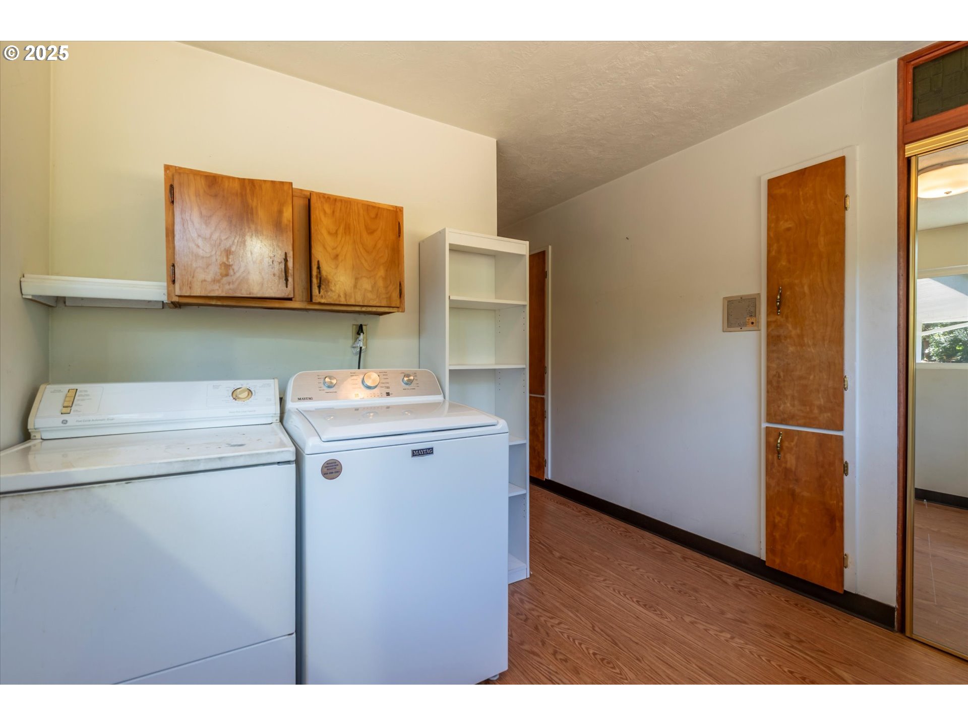 56060 Wheeler Road Bandon, OR 97411 - Photo 25 of 43 a bathroom with a sink and a mirror