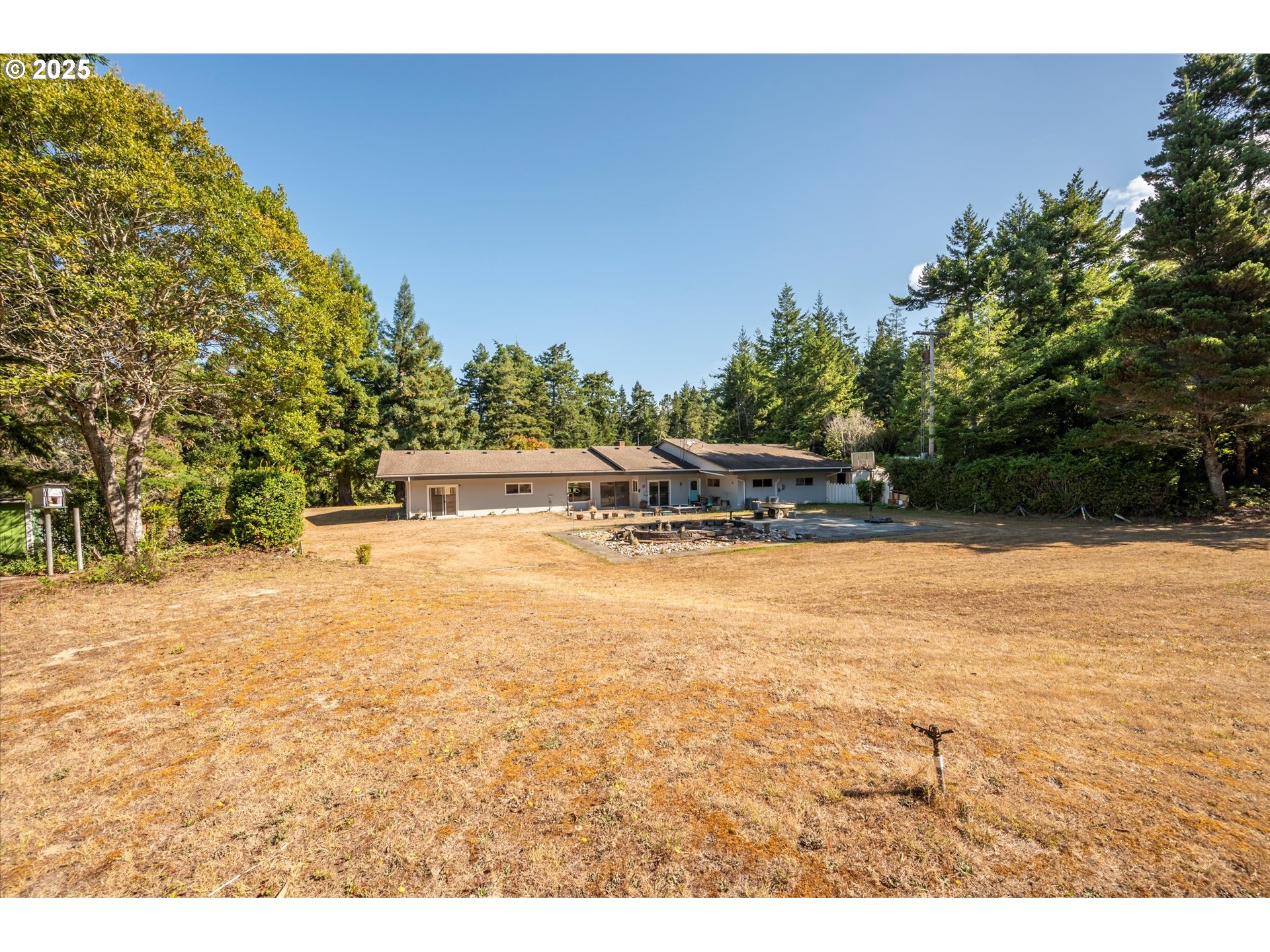 56060 Wheeler Road Bandon, OR 97411 - Photo 36 of 43 a picture of houses with outdoor space