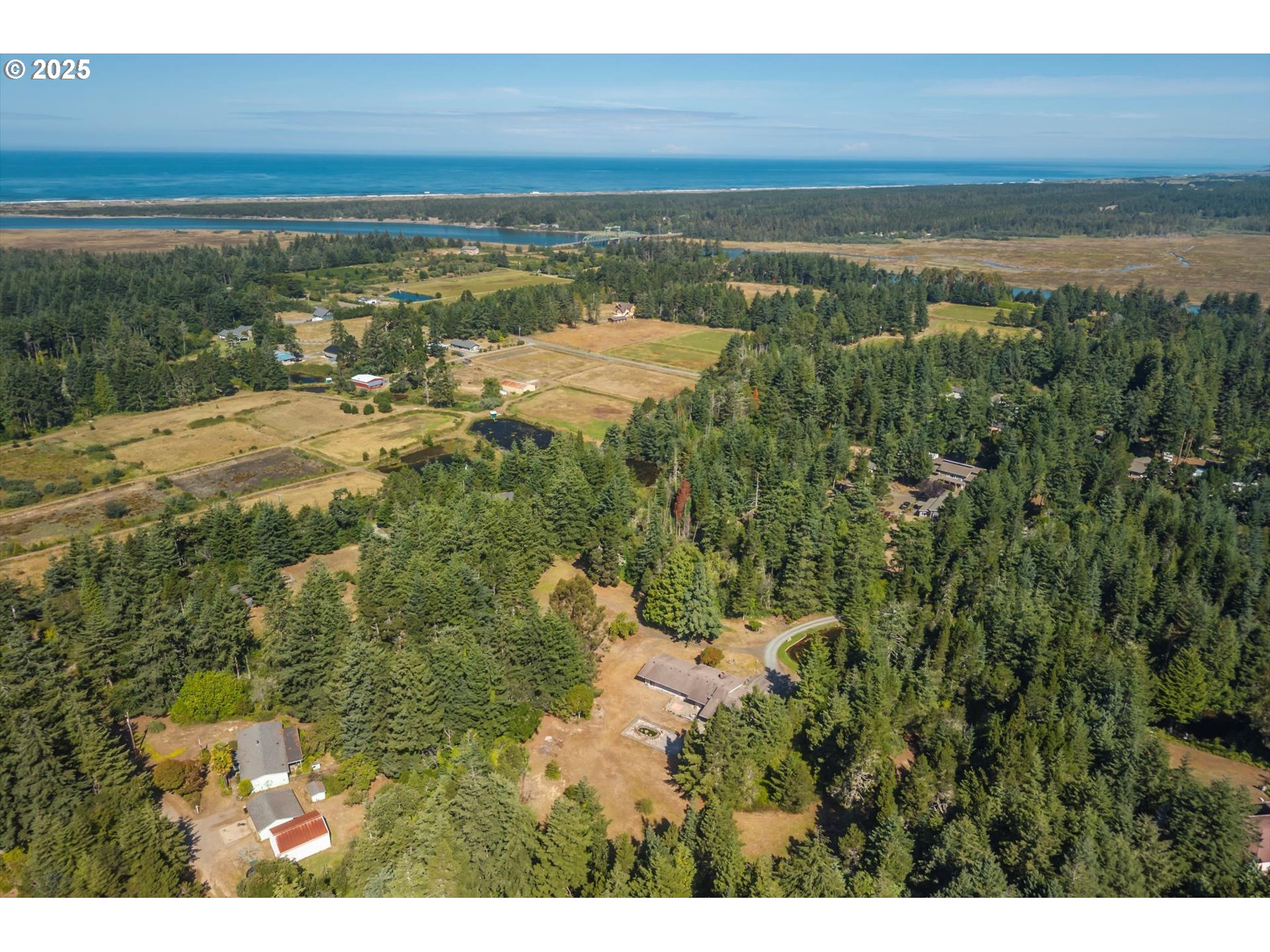 56060 Wheeler Road Bandon, OR 97411 - Photo 42 of 43 a view of an ocean and beach