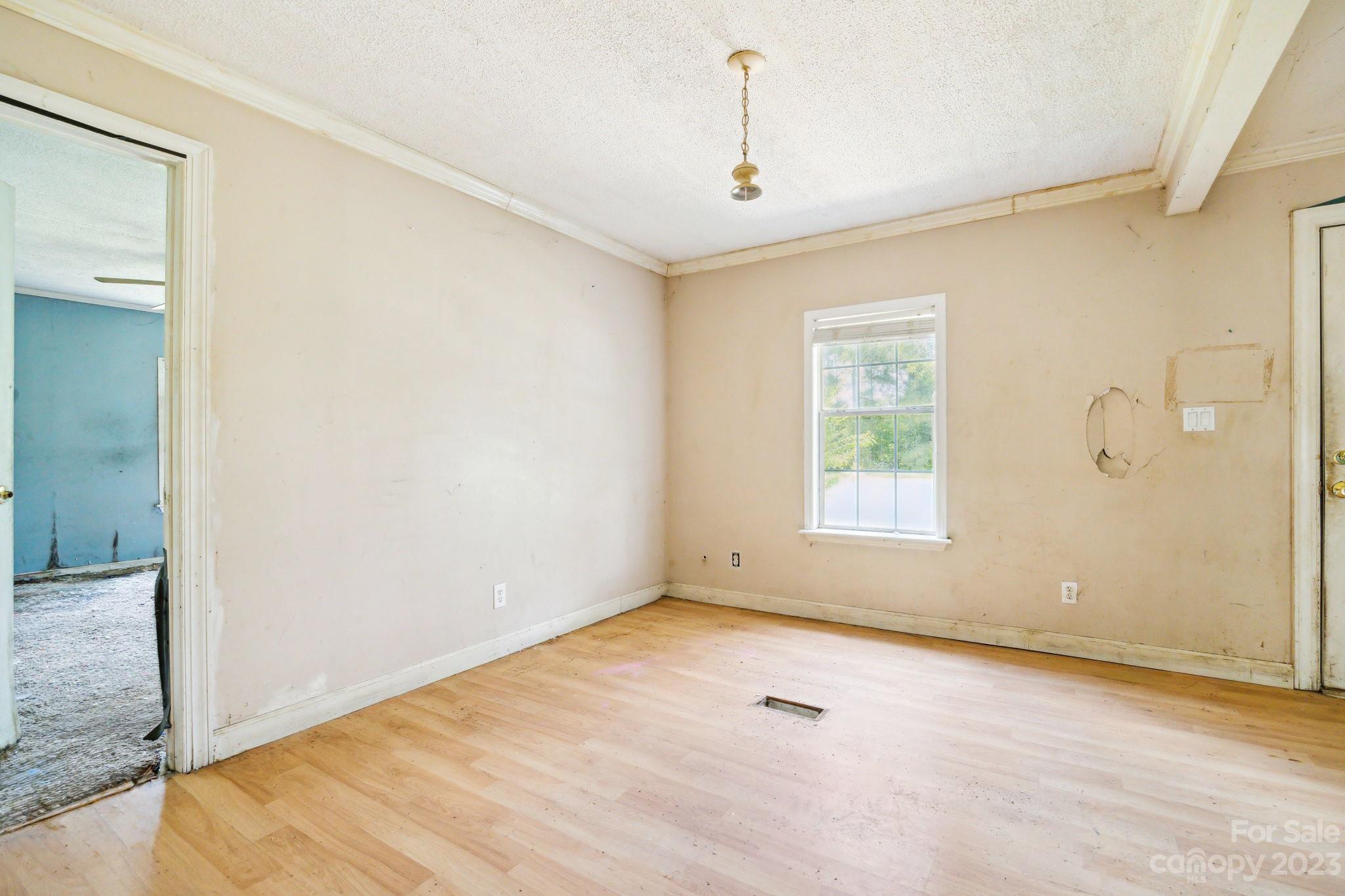 520 Wright Road Vass, NC 28394 - Photo 10 of 23 a view of an empty room with a window