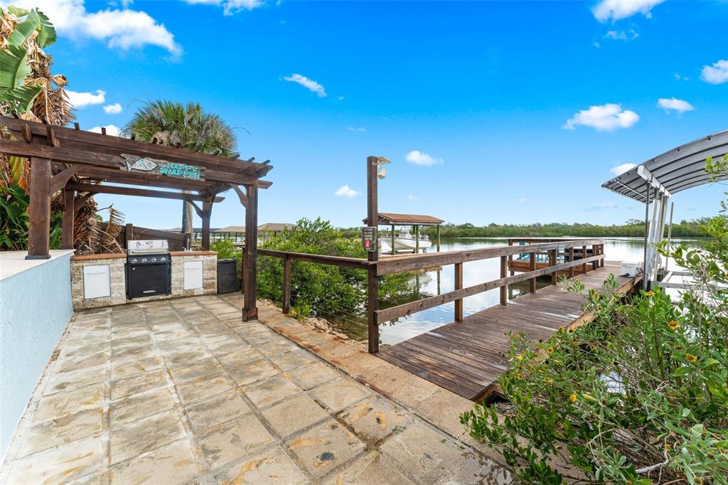 29 Pelican Lane Edgewater, FL 32141 - Photo 25 of 39 a view of a terrace with sitting area