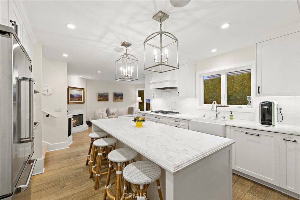 433 Seaward Road Corona del Mar, CA 92625 - Photo 7 of 36 Marble kitchen, stainless appliances