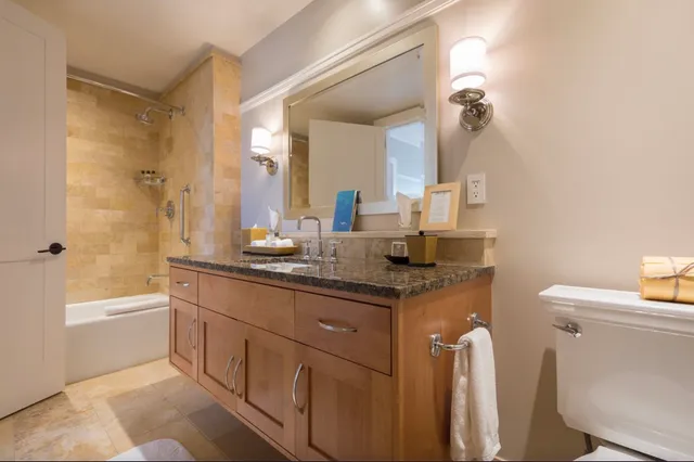 a view of a swimming pool with a table and chairs