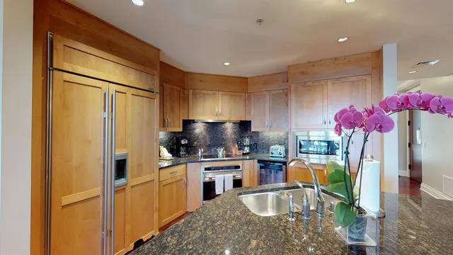 a view of a golf course with an ocean